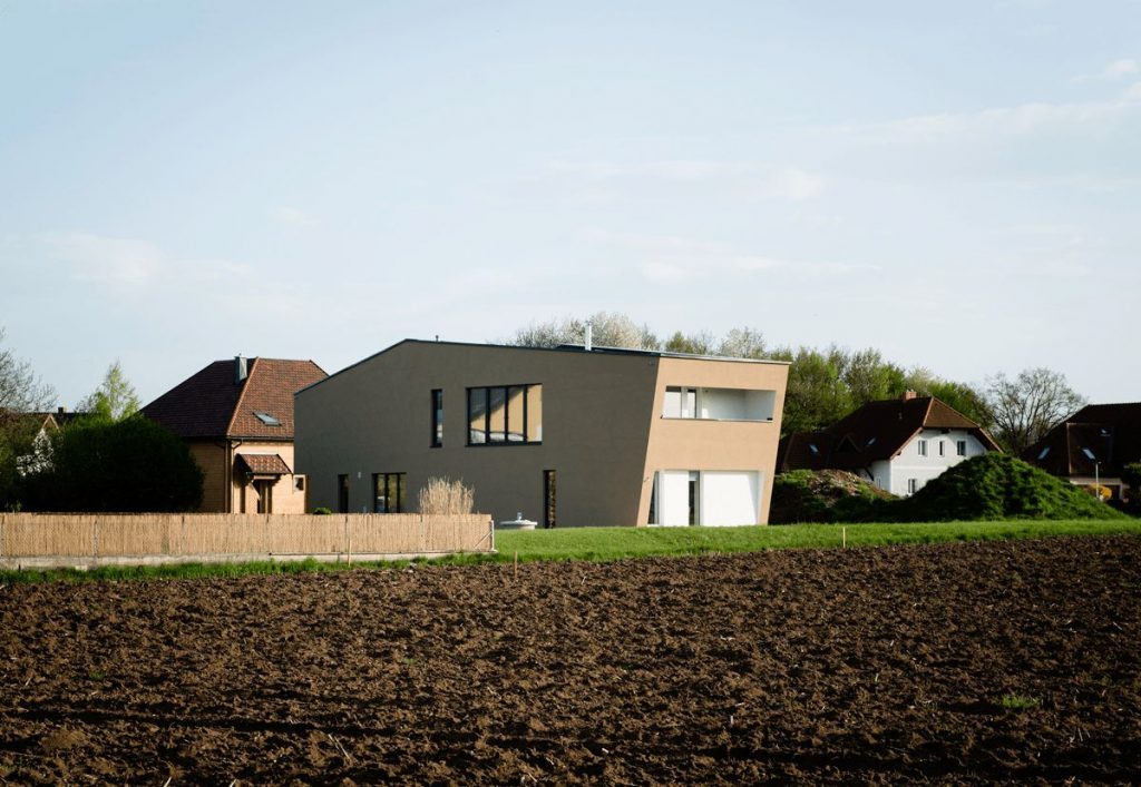 A house with a grass field