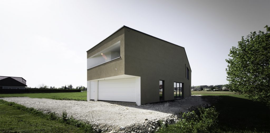 A house with trees in the background